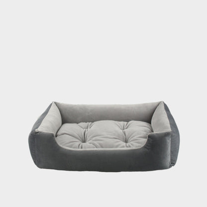 Plush Calming Pet Sofa Bed — 7 Sizes (45–110cm), Baby Fleece, Removable Cushion, Waterproof Base